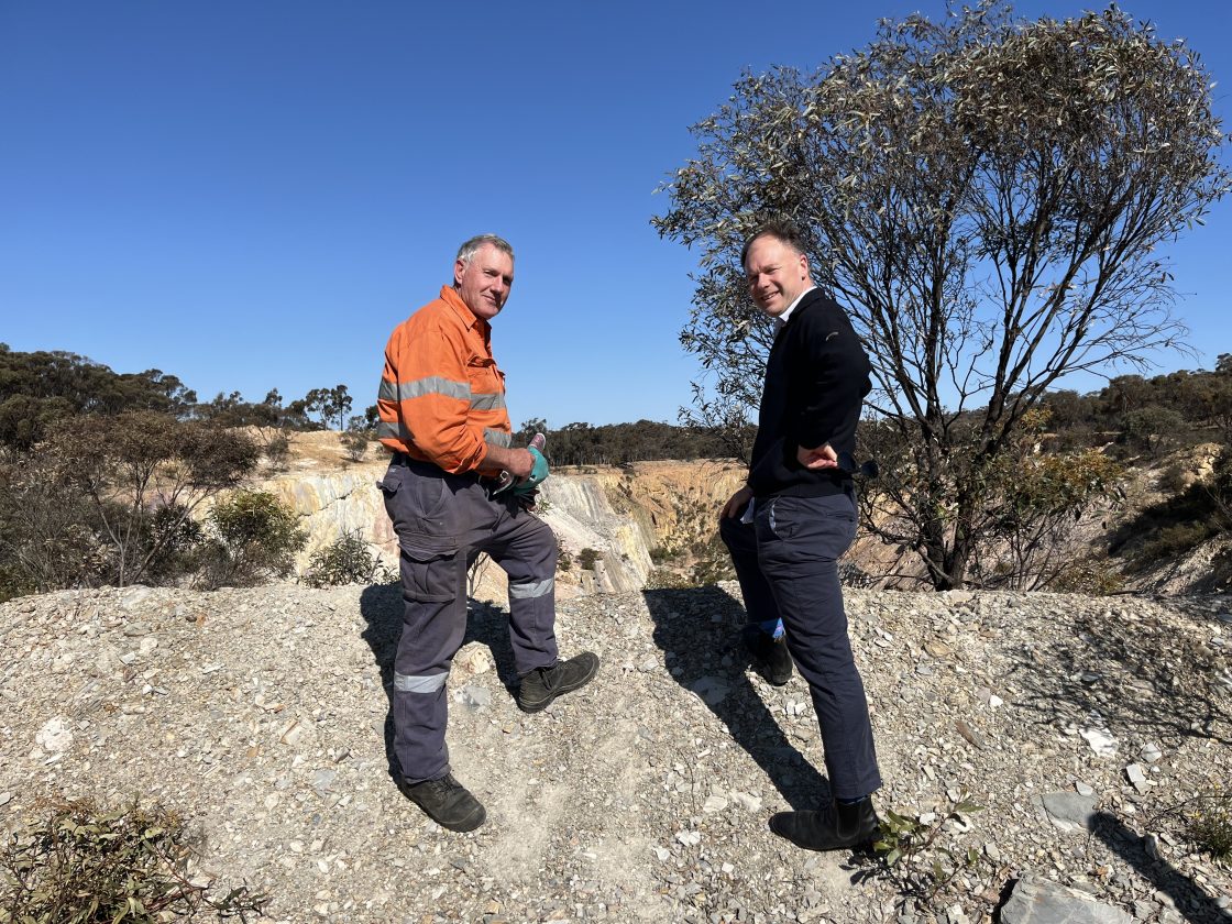 Two people standing on gold deposit Victoria