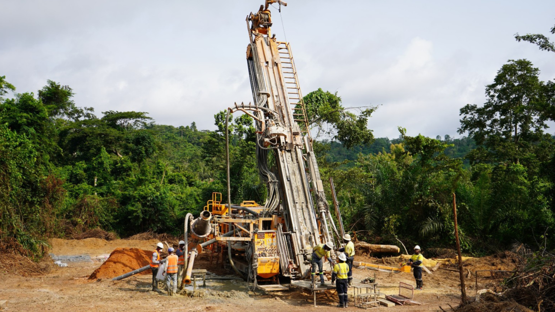 Wide-angle shot of Newcore Gold's drill rig at the Enchi Gold Project