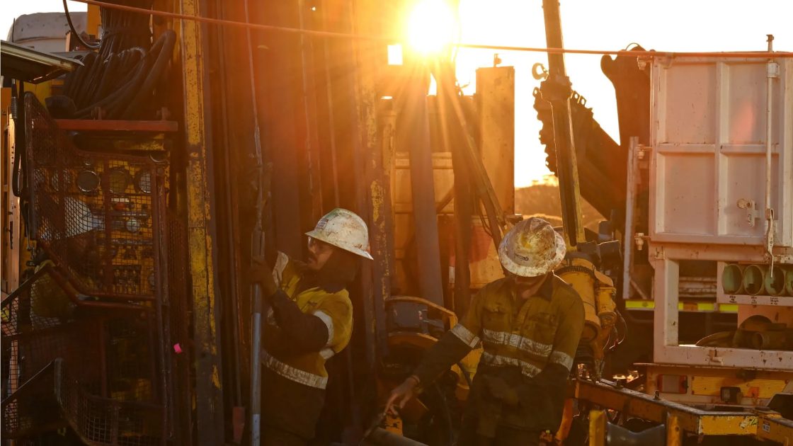 Image of workers at a mining site