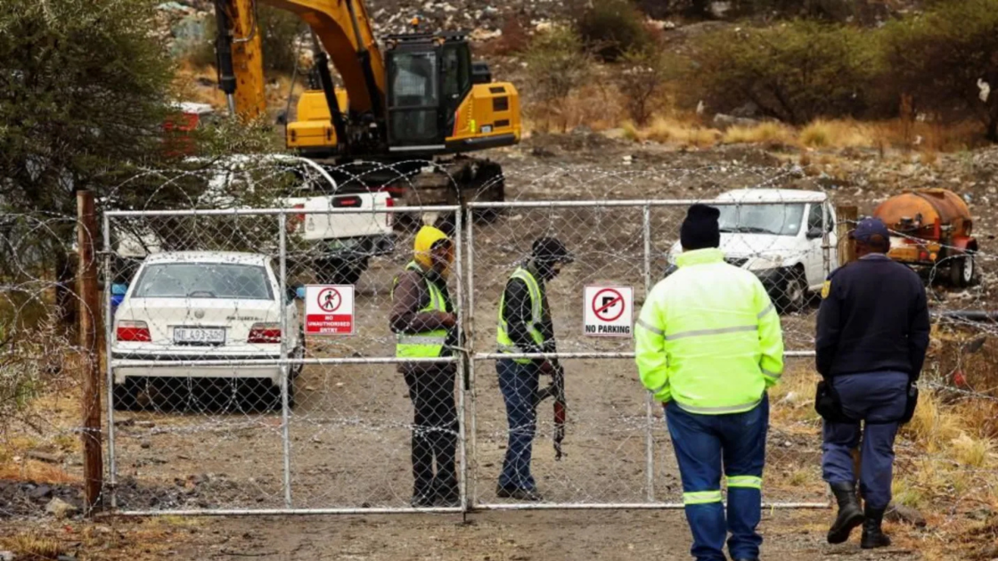 South Africa mine dump collapse kills 14