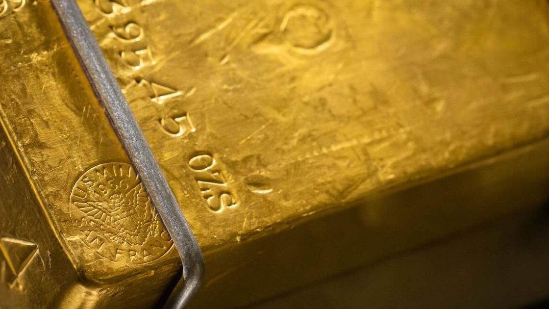 Gold price hits one-month low as oil surges