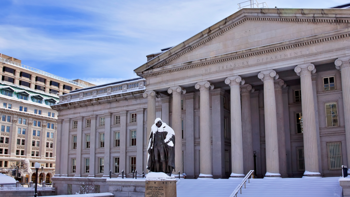 Front of the US Department of the Treasury building during snow
